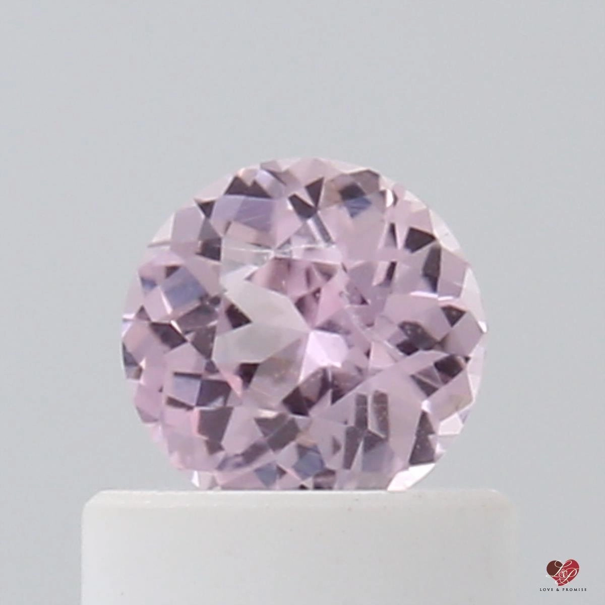 0.54cts Round Peach Blush Champagne Sapphire