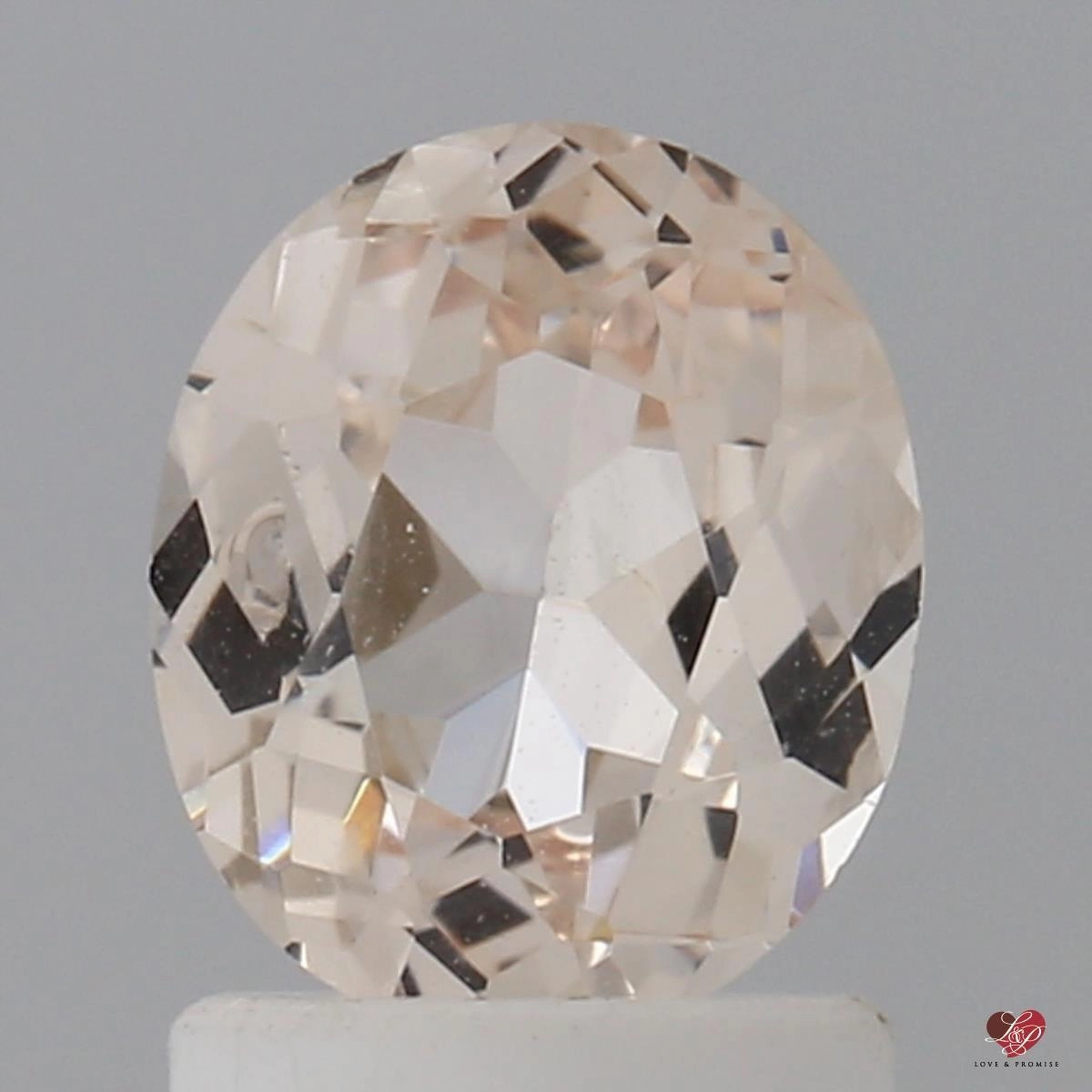1.32cts Oval Faint Icy Peach Champagne Blush Sapphire