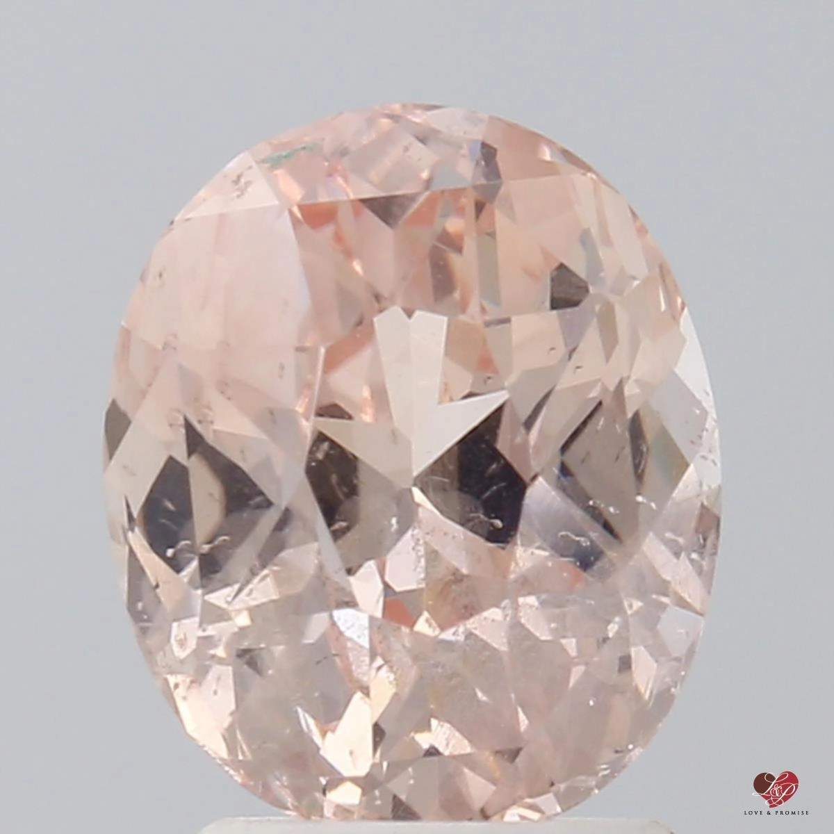 2.93cts Oval Peach Blush Champagne Sapphire